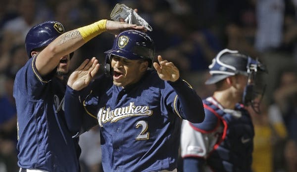 Trent Grisham’s second career home run was a 400-foot, three-run blast in the eighth inning for the Brewers.