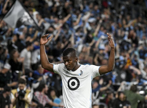 Minnesota United forward Darwin Quintero, shown trying to get supporters into a game earlier this season, said he was frustrated and hurt about not st