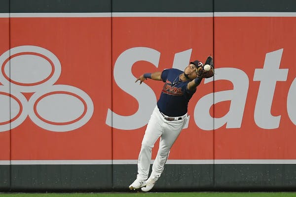 The Twins' Luis Arraez was unable to make a catch off the wall on a double hit by Nationals third baseman Anthony Rendon in the top of the sixth innin