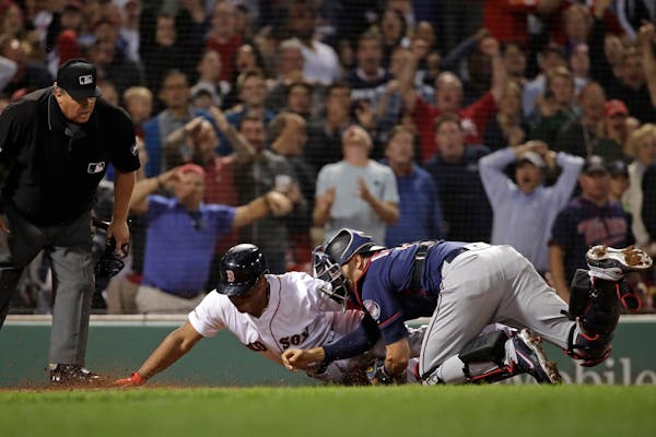 He’s out! Jason Castro tagged the Red Sox’s Rafael Devers at home in the ninth inning, preserving the Twins’ 2-1 victory and a series win at Fen
