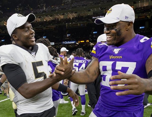 The Vikings — that’s Everson Griffen grinning — were glad to see Teddy Bridgewater for an August exhibition. His popularity in New Orleans is to