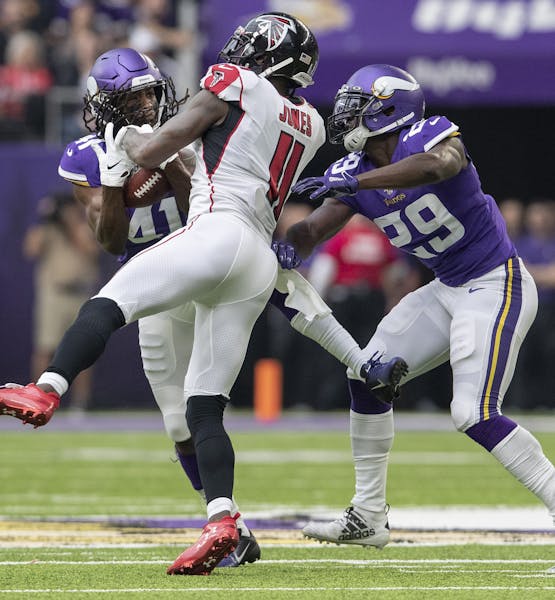 Vikings safety Anthony Harris (41) often found himself in the right place at the right time against Atlanta on Sunday, including on the first of his t