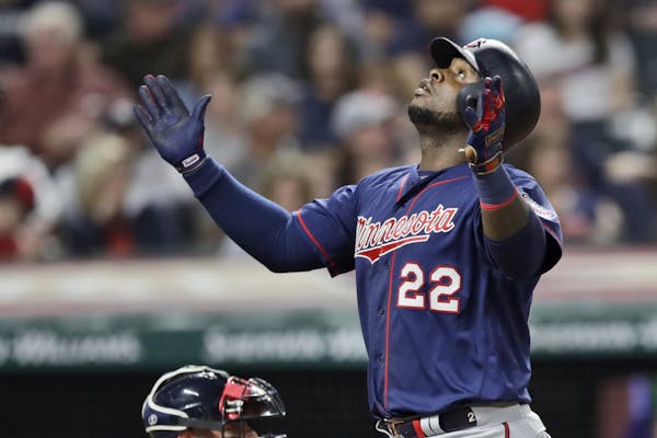 Minnesota Twins' Miguel Sano looks up after hitting a Grand Slam in the eighth inning in the second baseball game of a baseball doubleheader against t