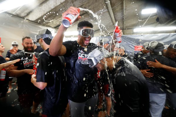The Twins celebrated after clinching the AL Central on Wednesday in Detroit.