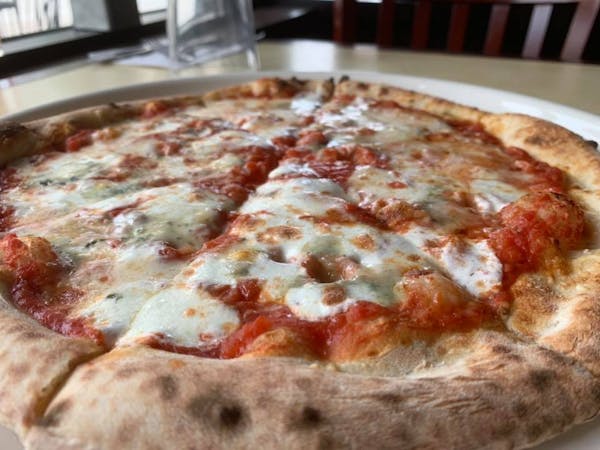 Pizza Nea has been a Twin Cities favorite for authentic Neapolitan crust pizza.