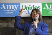 Trailing others in the polls and in fundraising, Sen. Amy Klobuchar vowed to stay in the presidential race until the end.