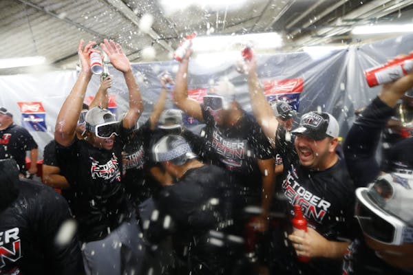 Minnesota Twins celebrate after the Twins clinched the AL Central, Wednesday, Sept. 25, 2019, in Detroit. The Twins defeated the Detroit Tigers 5-1, a