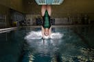 Edina diver Megan Phillip is seeking her fourth Class 2A state diving title this year. All five members of her family are divers. Photo: CARLOS GONZAL