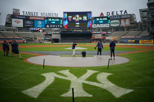 Twins players, including second baseman Luis Arraez, fielded grounders during a workout in the drizzle at Yankee Stadium on Thursday afternoon.