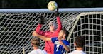 East Ridge goalkeeper Nick Wagner blocked the ball away from the net late in the second half. Wagner's seven saves helped East Ridge beat host Woodbur