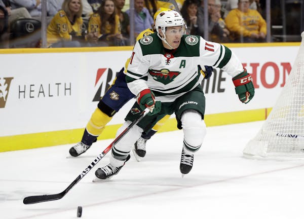 After one unproductive game, veteran left wing Zach Parise, above, was moved to the Wild’s second unit as coach Bruce Boudreau looks for an early sp