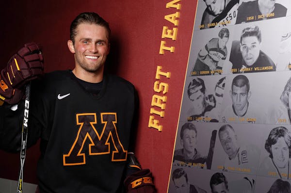 Senior Tyler Nanne stood next to photos of Gophers greats, including his grandfather Lou Nanne near the U. team locker room. His dad also played for M