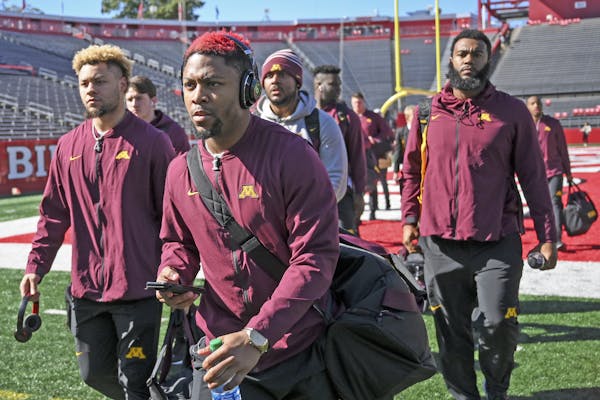 Gophers running back Rodney Smith, center, is not just his old self but better, coach P.J. Fleck said.