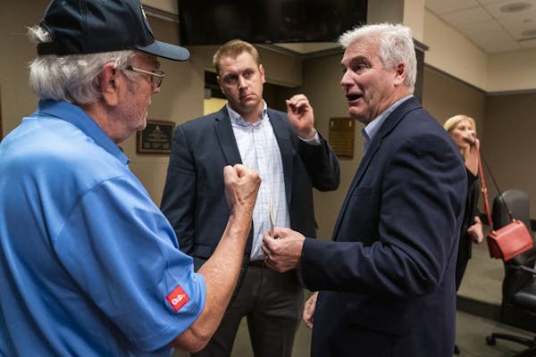 U.S. Rep. Tom Emmer (R-Minn) greeted Glenn Wachter of Blaine after a town hall meeting at Blaine City Hall.