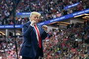 President Donald Trump greeted cheering crowds at the Target Center in Minneapolis, Minnesota.