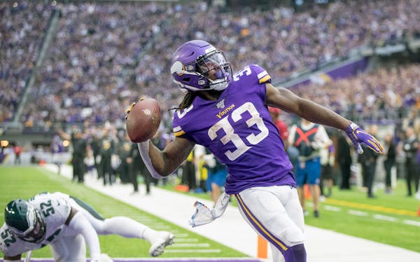 After his touchdown, Vikings running back Dalvin Cook threw the ball into the stands in the fourth quarter.