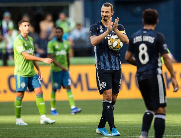 Los Angeles Galaxy’s Zlatan Ibrahimovic claps after tying the score against the Seattle Sounders during an MLS soccer game on Sept. 1 at CenturyLink