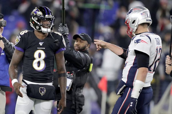 Lamar Jackson and Tom Brady exchanged greetings before the Ravens-Patriots game Sunday.
