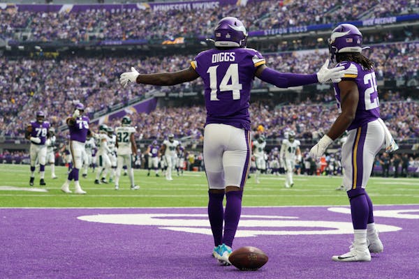 Minnesota Vikings wide receiver Stefon Diggs (14) reacted after scoring a touchdown early in the second quarter.