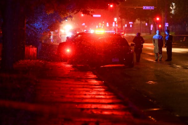 Minneapolis police investigated the scene where a shooting victim was found dead on N. Lyndale Avenue North near 18th on Friday night.