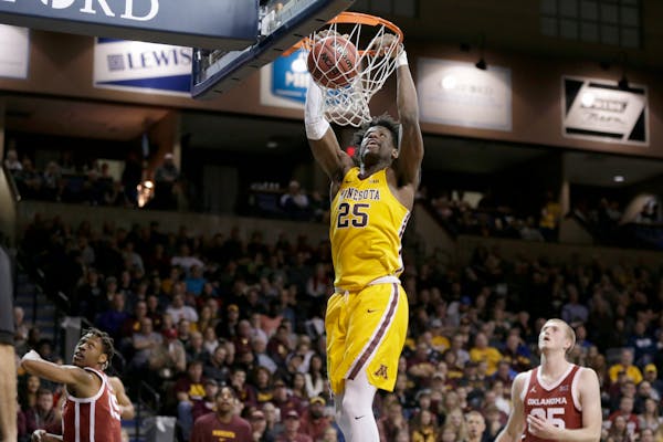 Gophers center Daniel Oturu scored 15 points against Oklahoma in Sioux Falls, S.D., on Saturday, but the Gophers need to do a better job of working th