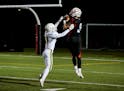 Centennial receiver Carter Anderson (8) connects with a pass from Connor Zulk for a 37 yard touchdown in the second quarter. Anderson, the Cougars lea