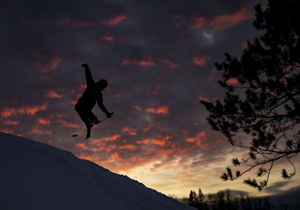 A skier jumped off a snow bank at Mont Du Lac ski resort on Thursday. Mont Du Lac ski resort in Superior, Wis., opened its slopes for the first runs o