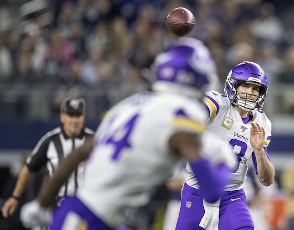 Minnesota Vikings' quarterback Kirk Cousins looked passed the ball to Minnesota Vikings' wide receiver Stefon Diggs in the third quarter.