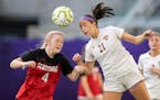 Brittany Bordson (4) of Centennial and Kelley Kloncz (21) of Maple Grove fought for a ball in the first half. ] CARLOS GONZALEZ • cgonzalez@startrib