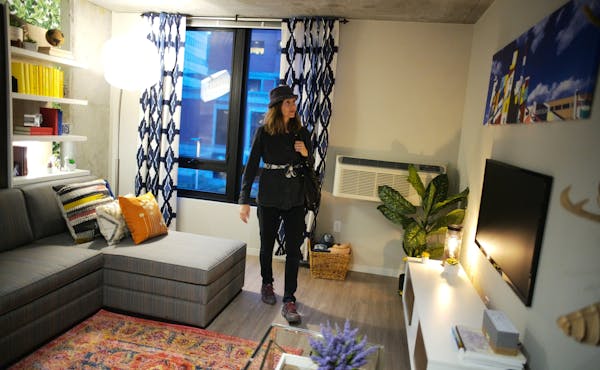 Janet Lewis explored a third-floor unit. Many millennials are willing to rent micro apartments in exchange for common space and lower rent.