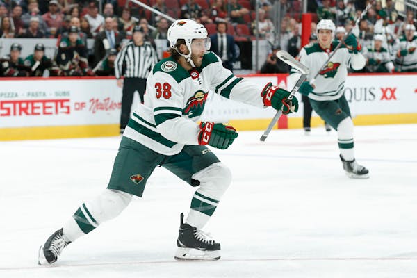 Wild right wing Ryan Hartman celebrates after scoring a goal against the Coyotes in the third period