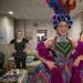 Children’s Theatre Company’s Andi Soehren tightened a corset onto actor Autumn Ness as they got ready in the dressing room for a dress rehearsal f