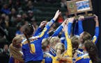 Minneota players celebrated the win over WEM with their first place trophy. ] ANTHONY SOUFFLE • anthony.souffle@startribune.com Minneota played Wate