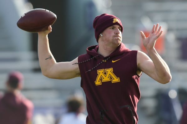 Minnesota Gophers quarterback Tanner Morgan (2) warmed up before Saturday's game against the Northwestern Wildcats.