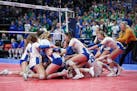 Wayzata players celebrated with her teammates after they defeated Eagan in the fifth set. ] ANTHONY SOUFFLE • anthony.souffle@startribune.com Eagan 