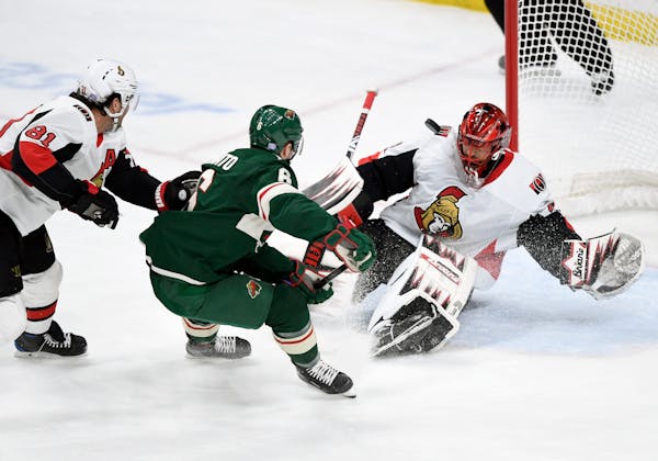 Ottawa goaltender Anders Nilsson blocks a shot by the Wild's Ryan Donato on Friday. Donato finished with three points in the game, a goal and two assi