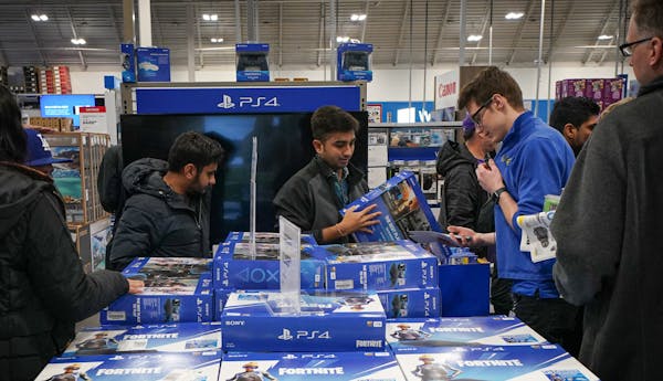 Shoppers looked for deals on PS4 and Xbox at the Richfield Best Buy store just after it opened at 5 p.m. Thursday. Nov. 28.