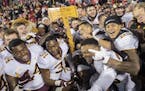 The Gophers celebrated with Paul Bunyan's Axe after beating Wisconsin at Camp Randall Stadium in 2018.