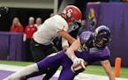 Chaska linebacker Stevo Klotz (above, scoring on a 36-yard touchdown run vs. Coon Rapids) doubles as a running back for the physical Hawks.