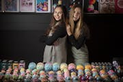 Isabel Bercaw, left, and sister Caroline continue to be the creative force behind their company, Da Bomb Bath Fizzers.