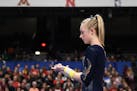 Chaney Neu of Champlin park waited to begin her routine on the uneven bars at the state meet last February. COURTNEY DEUTZ • courtney.deutz@startrib