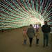 Visitors walked through the 540 foot long entrance tunnel lit with 220,000 lights.