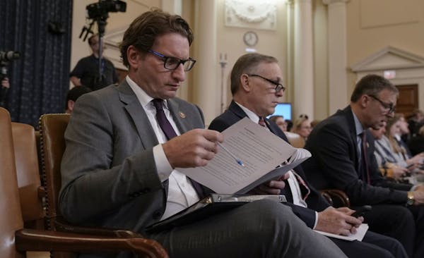 Last month, Rep. Dean Phillips, D-Minn., left, sat in as the House Intelligence Committee questioned U.S. Ambassador to the European Union Gordon Sond