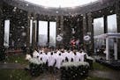 Actors perform during a ceremony to commemorate the 75th anniversary of the Battle of the Bulge at the Mardasson Memorial in Bastogne, Belgium on Mond