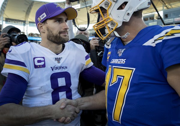Minnesota Vikings quarterback Kirk Cousins spoke with Los Angeles Chargers quarterback Philip Rivers at the end of the game.