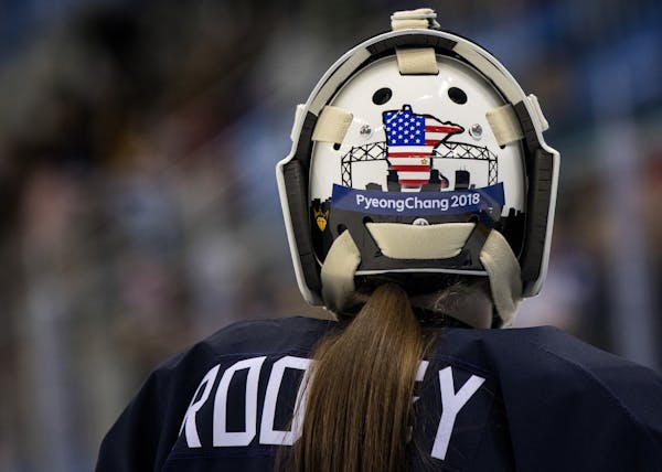 The Minnesota and Duluth themed mask of USA goalie Maddie Rooney (35).