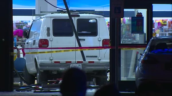 Van crashes into Seattle store, injuring 11