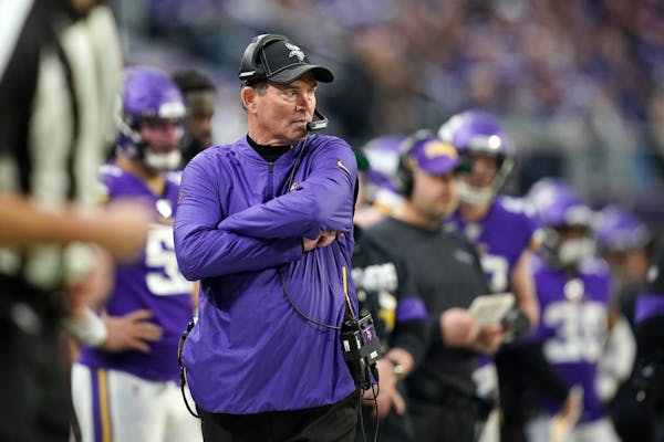 Vikings head coach Mike Zimmer watched from the sidelines in the final minute of the fourth quarter.