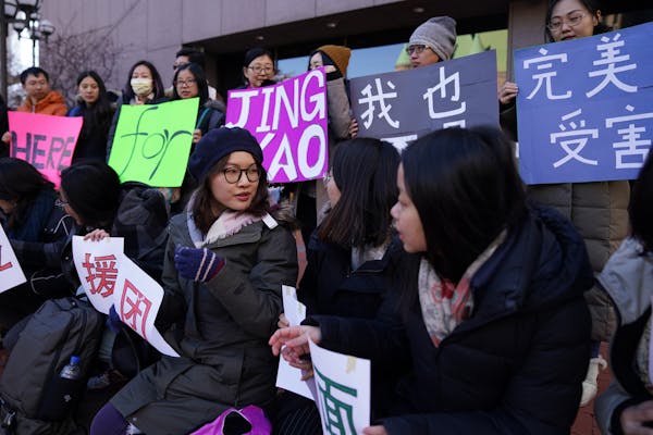 Supporters of the University of Minnesota student who accused Chinese billionaire Richard Liu of rape rallied at the Hennepin County Government Center