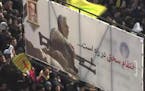 Crowds in Tehran mourn slain General Soleimani